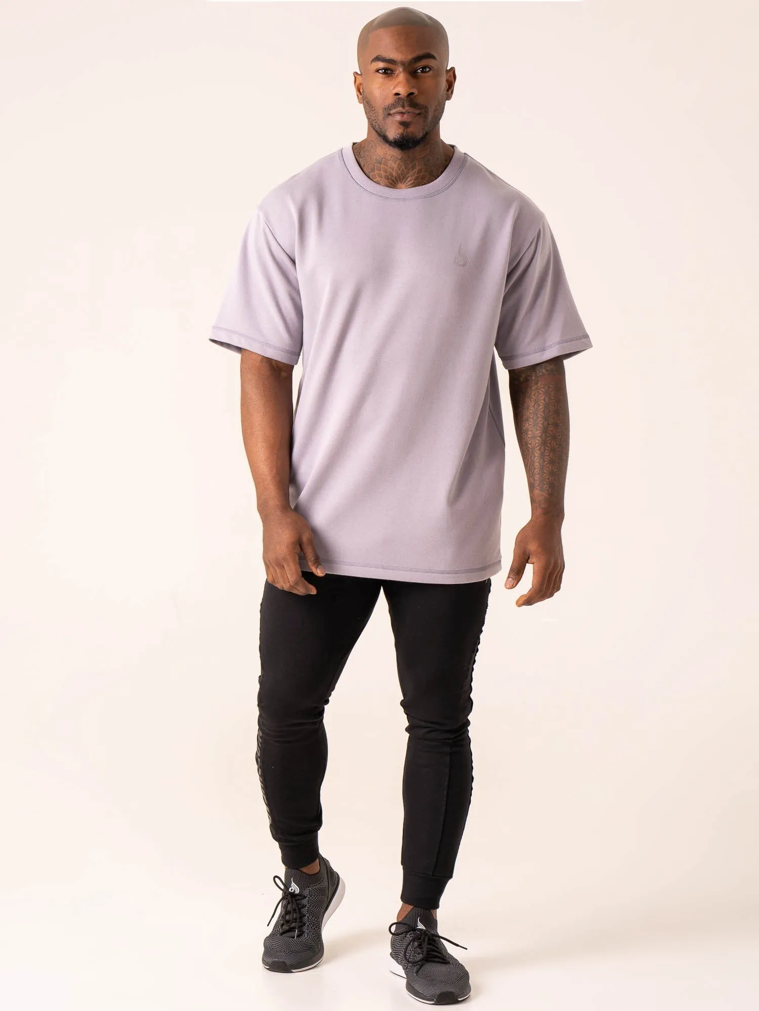 Throwback Oversized Fleece T-Shirt - Lavender graphic design